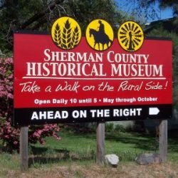 Photo of the Sherman County Historical Musuem signage on Highway 97 in Moro, Oregon.