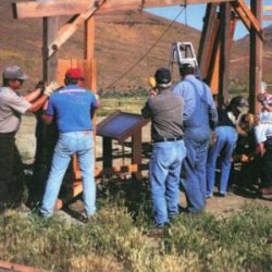 Photo of Bureau of Land Management and volunteers constructing the shelter and interpretive signs.
