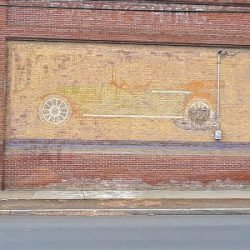 Photo of painted advertisemtn on teh Crosfiled building in Wasco, Oregon.